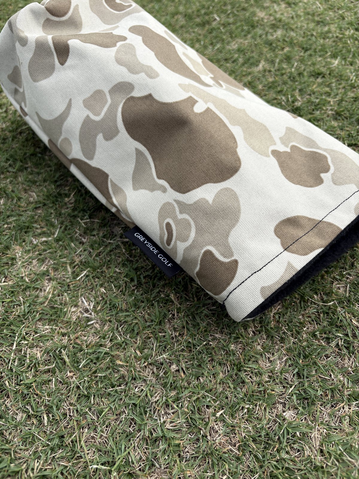 Desert frogskin camo headcover, The Beach Side, on a driver