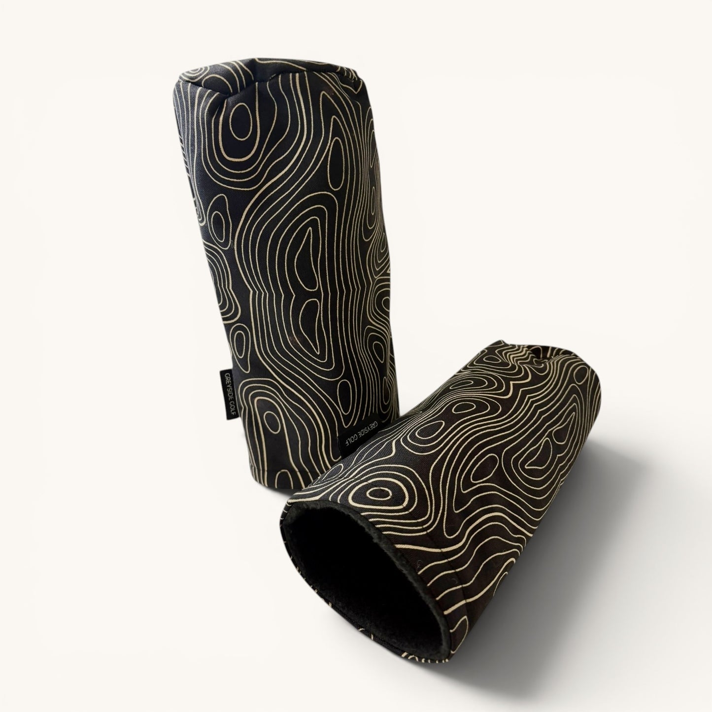 Greyside Golf black topographic Camo driver headcover made from Cordura, with black fleece interior and elastic closure.
