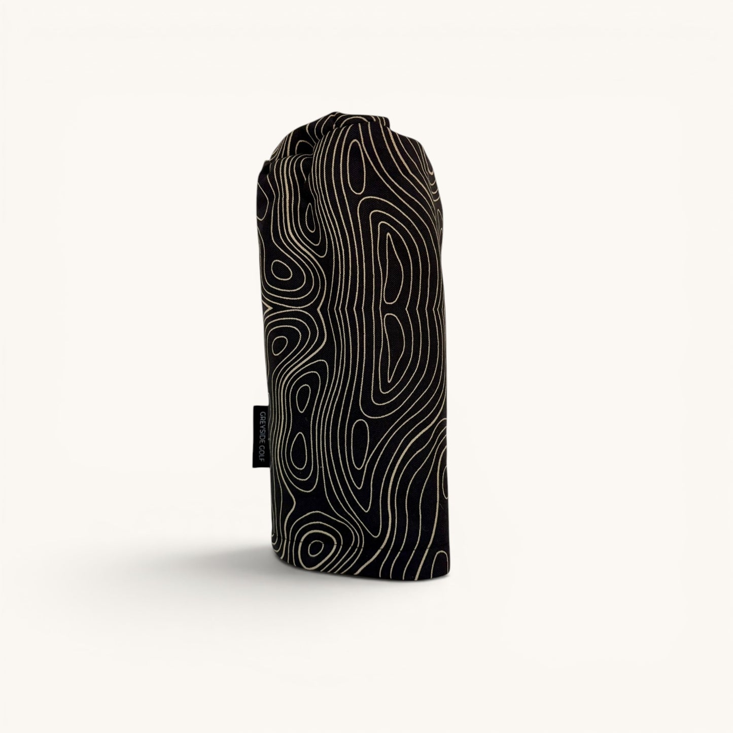 Greyside Golf black topographic Camo driver headcover made from Cordura, with black fleece interior and elastic closure.