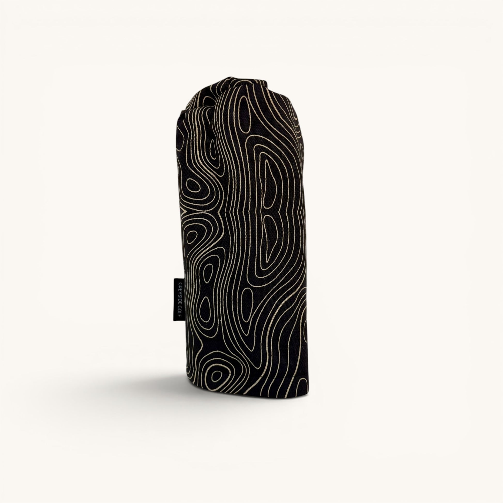 Greyside Golf black topographic Camo driver headcover made from Cordura, with black fleece interior and elastic closure.