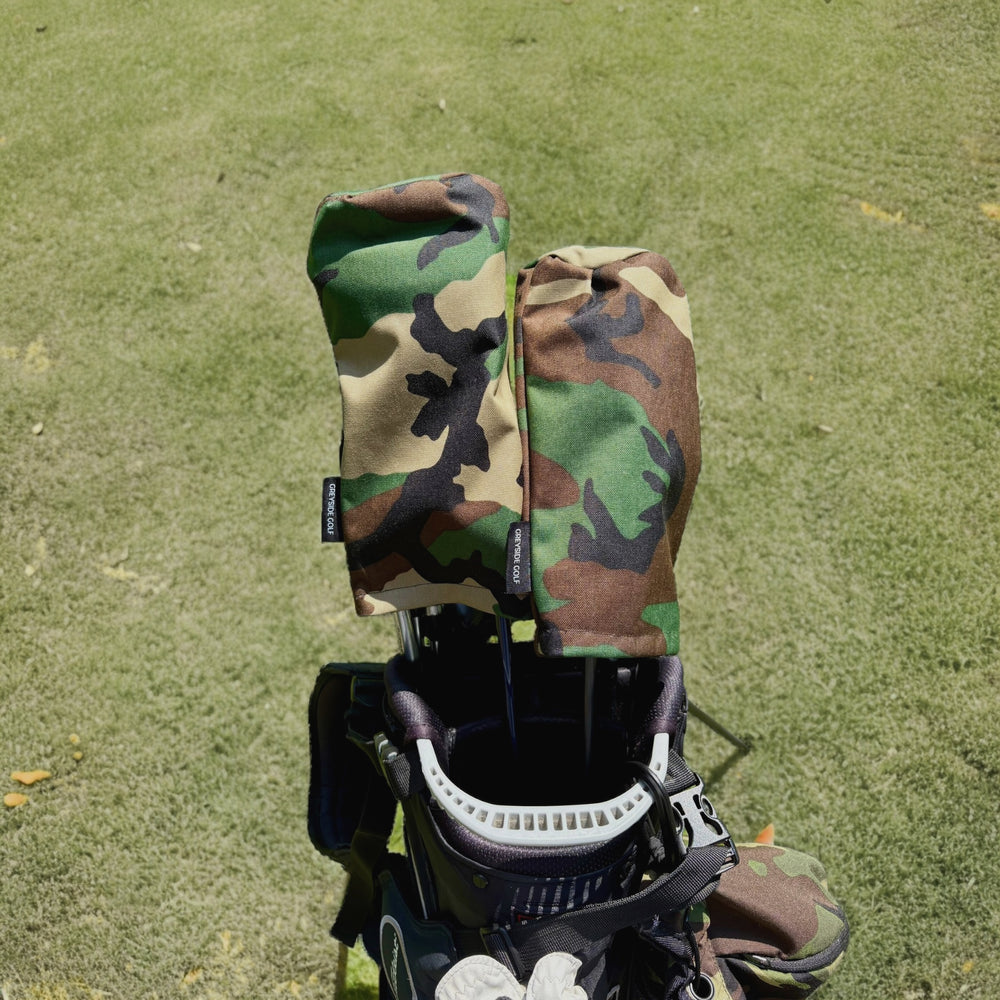 The Treeline M81 woodland camo headcovers on driver and wood in golf bag on course