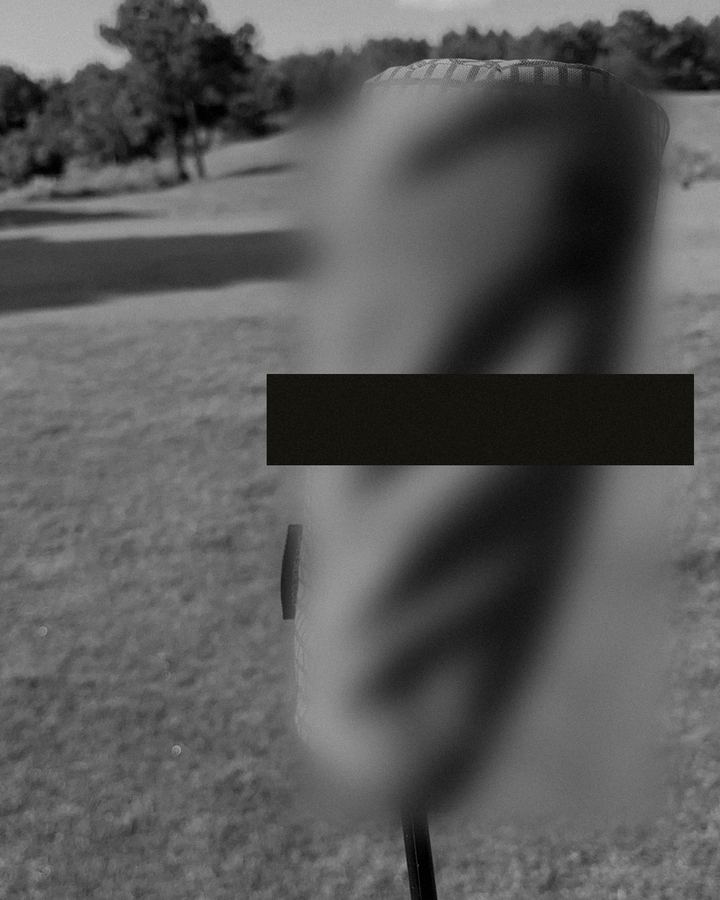 Exhibit 02-D headcover on a driver, redacted